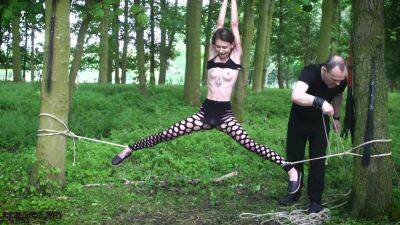 Submissive teen tied up in the woods - anysex.com